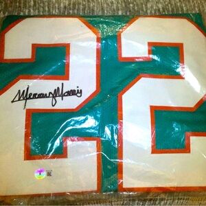 New Autographed Mercury Morris Miami Dolphins Teal Jersey. Beckett Approved.